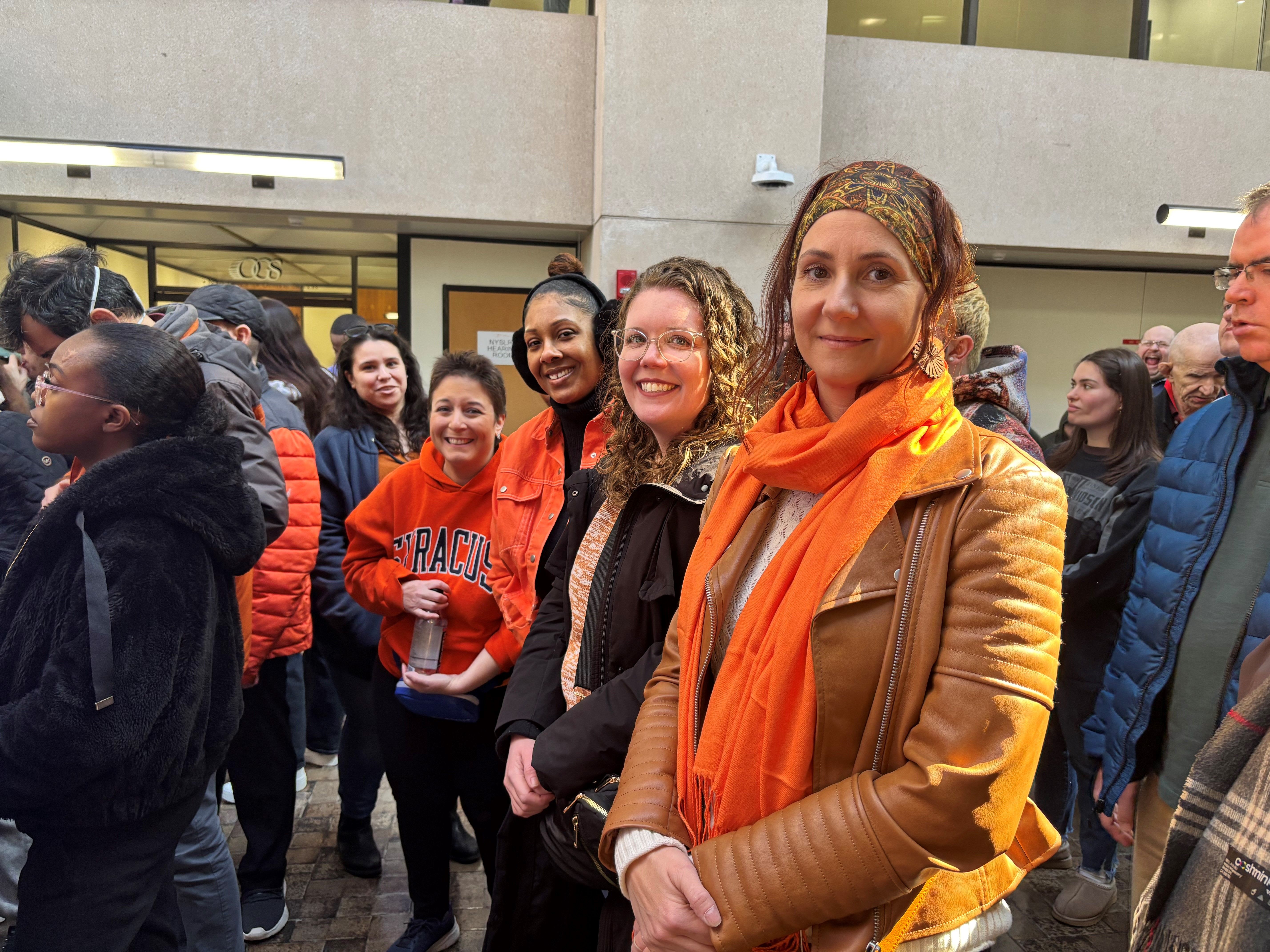 Care Design team members together for rally 
